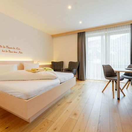 Stampferhof Hotel Weissensee Bagian luar foto