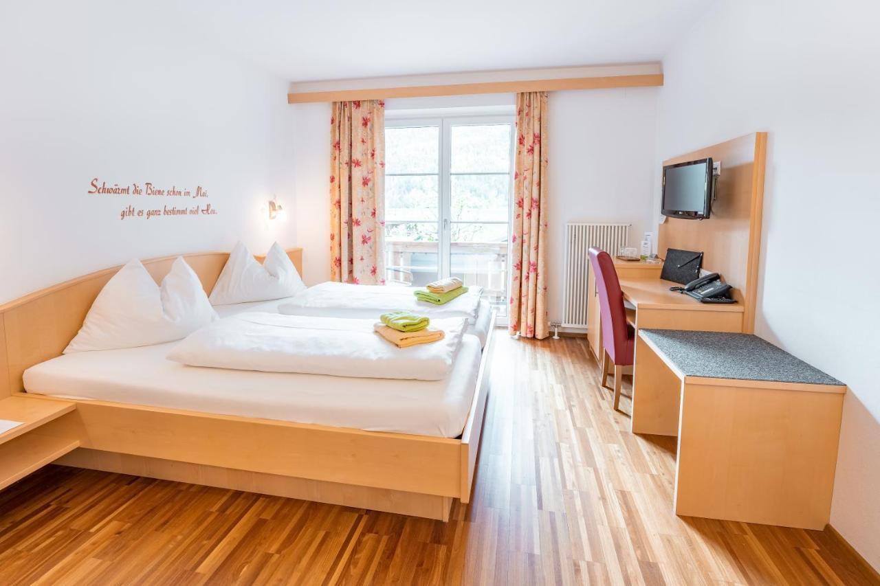 Stampferhof Hotel Weissensee Bagian luar foto